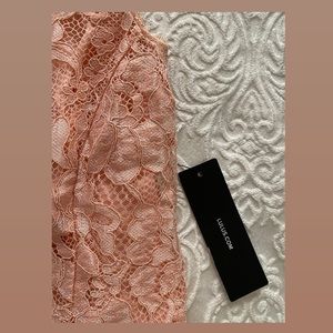 Brand new open back lace dress